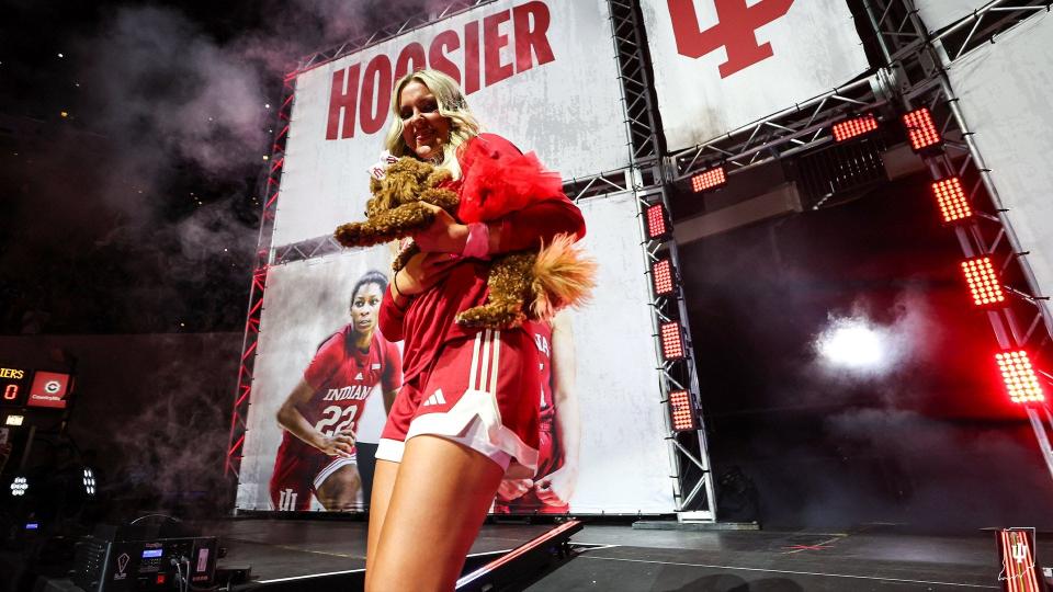 Indiana guard 	Sydney Parrish is introduced at Hoosier Hysteria and brings out her dog Chanel with her.