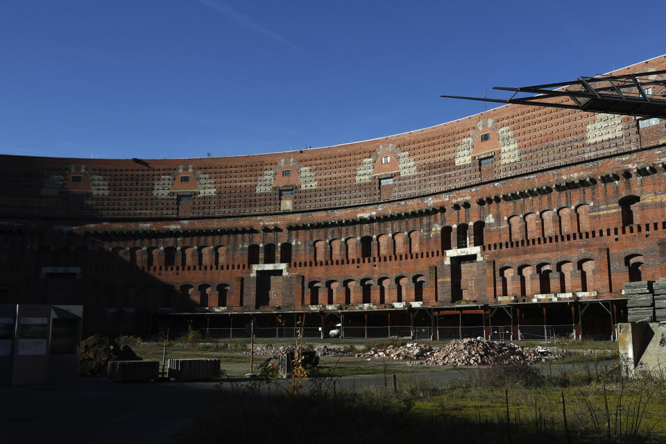 A shadow falls inside the 'Congress Hall' at the 'Reichsparteigelande' (Nazi Party Rally Grounds) in Nuremberg, Germany, Wednesday, Nov. 18, 2020. Germany marks the 75th anniversary of the landmark Nuremberg trials of several Nazi leaders and in what is now seen as the birthplace of a new era of international law on Friday, Nov. 20, 2020. (AP Photo/Matthias Schrader)