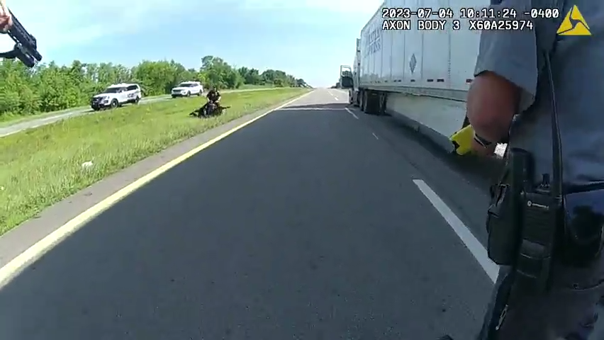 WARNING: Video contains graphic content. Bodycam footage shows the scenes that led up to a semi-truck driver being bitten by a Circleville police K-9 dog during a traffic pursuit arrest on July 4, 2023.