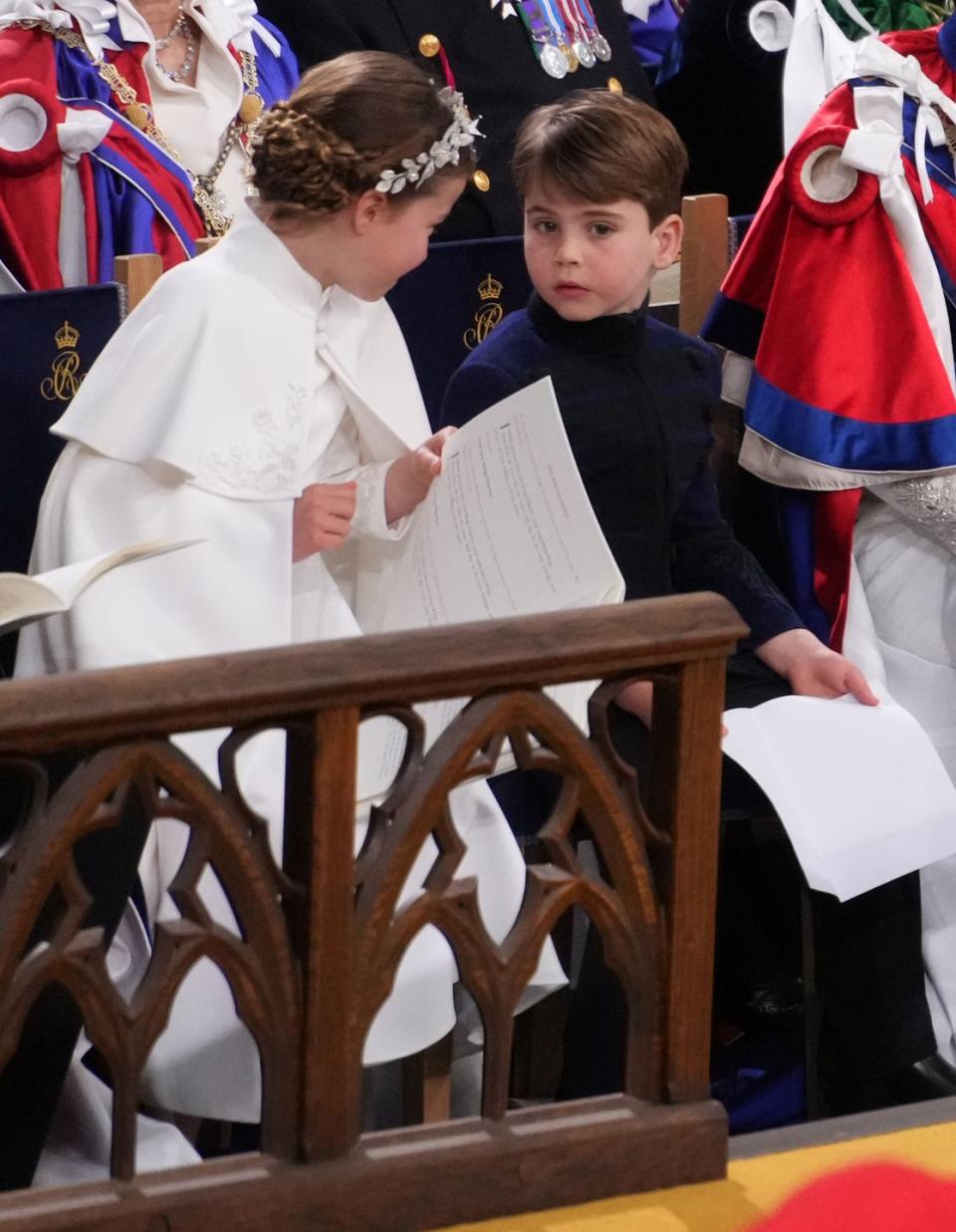 london, england may 06 princess charlotte and prince louis during the coronation of king charles iii and queen camilla on may 6, 2023 in london, england the coronation of charles iii and his wife, camilla, as king and queen of the united kingdom of great britain and northern ireland, and the other commonwealth realms takes place at westminster abbey today charles acceded to the throne on 8 september 2022, upon the death of his mother, elizabeth ii photo by victoria jones wpa poolgetty images