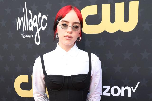 Billie Eilish Rocks a Black Corset Dress Over a Floor-Length White