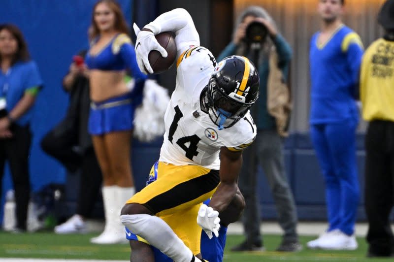 Pittsburgh Steelers wide receiver George Pickens (14) eludes a tackle while playing against the Los Angeles Rams on Sunday at SoFi Stadium in Inglewood, Calif. Photo by Jon SooHoo/UPI