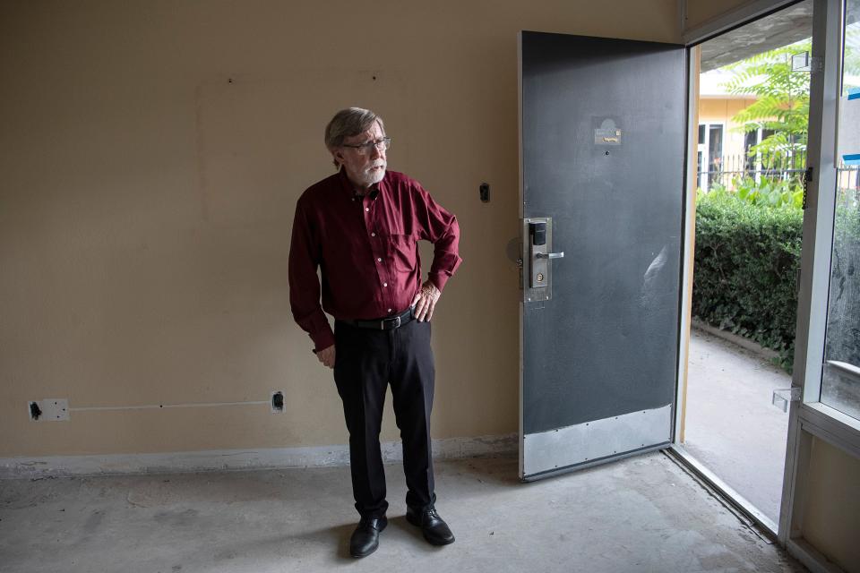 Jim Lowder, capital campaign manager for Homeward Bound's Home is Key initiative, in one of the hotel rooms at the former Days Inn on Tunnel Road, which will house members of Asheville's chronically homeless population.