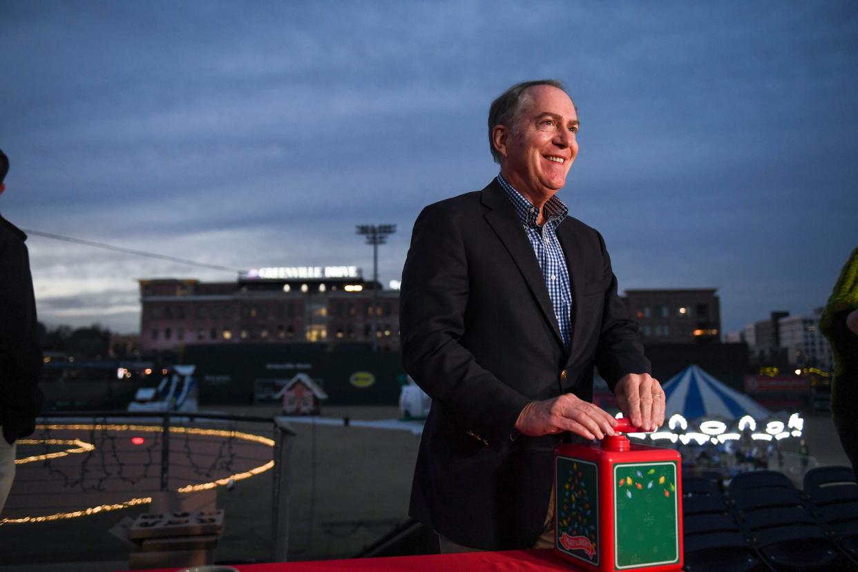 Mayor Knox White smiles during a count down before powering on Fluor Field's new LED stadium lights on Friday, Dec. 8, 2023.