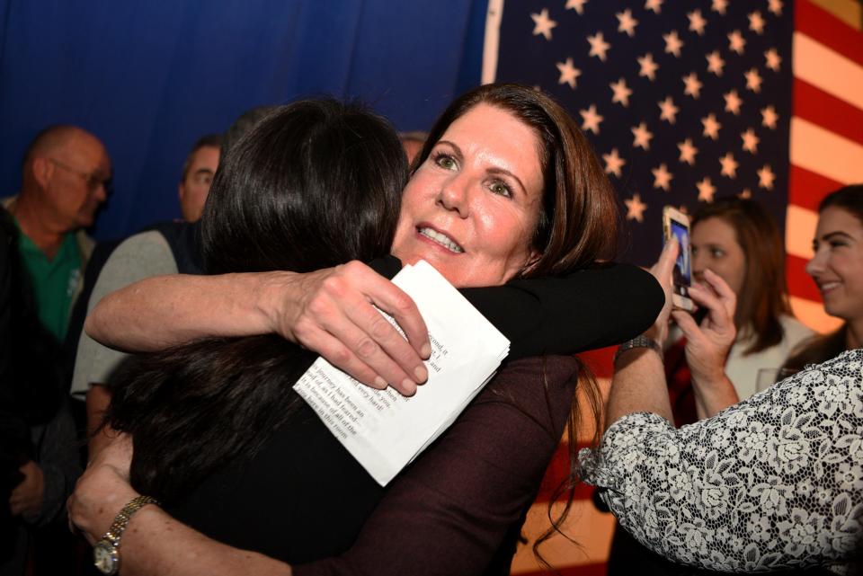 Kathy Hugin hugs a supporter after her husband U.S. Senate candidate Republican Bob Hugin and she, thank supporters on stage on election night after the polls close at the Stage House Tavern in Mountainside on Tuesday, November, 6, 2018. Hugin is running against incumbent Senator Bob Menendez.