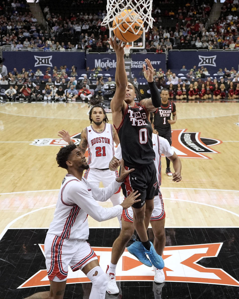 Texas Tech guard Chance McMillian (0) puts up a shot during the first half of an NCAA college basketball game against Houston in the semifinal round of the Big 12 Conference tournament, Friday, March 15, 2024, in Kansas City, Mo. (AP Photo/Charlie Riedel)