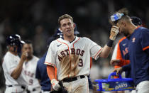 Houston Astros' Myles Straw (3) celebrates after scoring the game-winning run against the Texas Rangers during the 11th inning of a baseball game Thursday, May 13, 2021, in Houston. The Astros won 4-3 in 11 innings. (AP Photo/David J. Phillip)