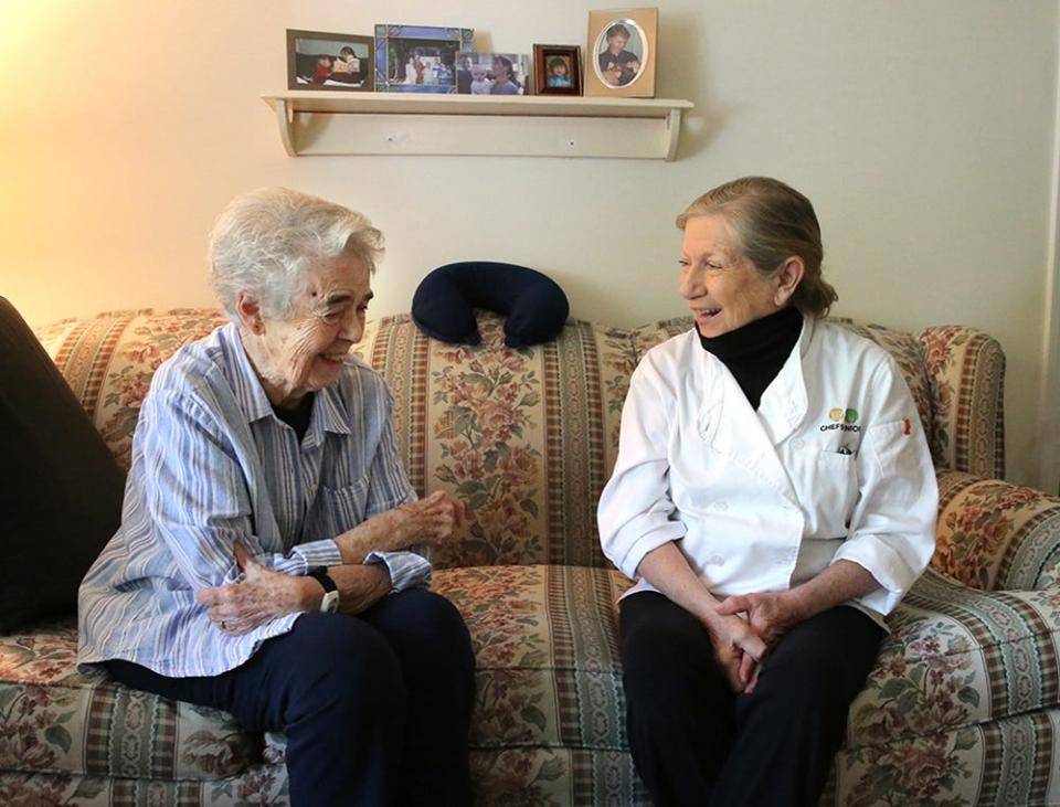 Kittery, Maine, resident Dorothy Richmond, left, and Jean Kerr of Chefs for Seniors chat to plan her meals for the next week.