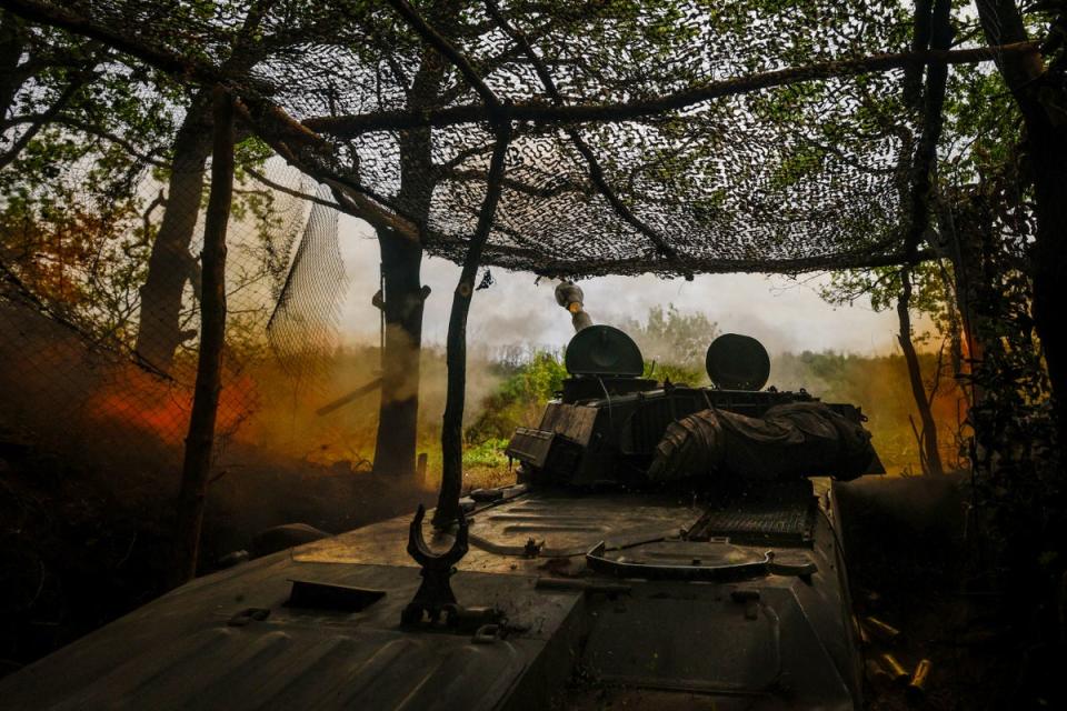 A self-propelled howitzer of Ukraine’s 57th brigade fires in the direction of Russian positions on the outskirts of Kupiansk, Kharkiv region (Reuters)