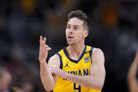 Indiana Pacers guard T.J. McConnell celebrates after making a three-point basket during the first half of Game 4 against the New York Knicks in an NBA basketball second-round playoff series, Sunday, May 12, 2024, in Indianapolis. (AP Photo/Michael Conroy)