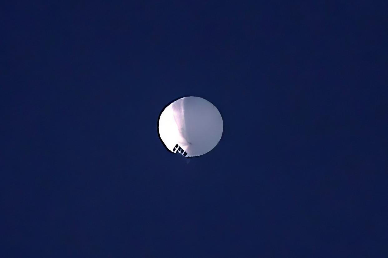 A high-altitude surveillance balloon from China photographed above Billings, Montana on 1 February. US officials say five were spotted above the country in recent years. (AP)