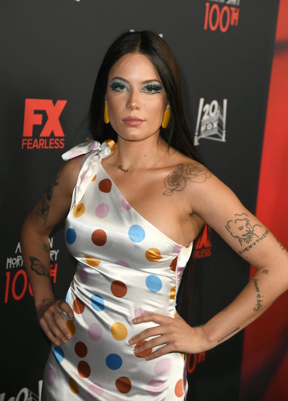 <p>Halsey has a match tattoo on her forearm that she got with three fans in 2015. She explained that she picked people at random on Twitter and <a href="https://www.iheart.com/content/2019-02-22-tattoo-stories-with-halsey-family-ink-matching-fan-tattoos-more/" class="link " rel="nofollow noopener" target="_blank" data-ylk="slk:got &quot;match-ing tattoos&quot; with them">got "match-ing tattoos" with them</a>.</p>