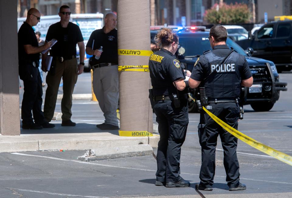 Stockton police investigate a homicide scene outside of the Golden 1 Credit Union at Sherwood Mall in Stockton earlier this year.