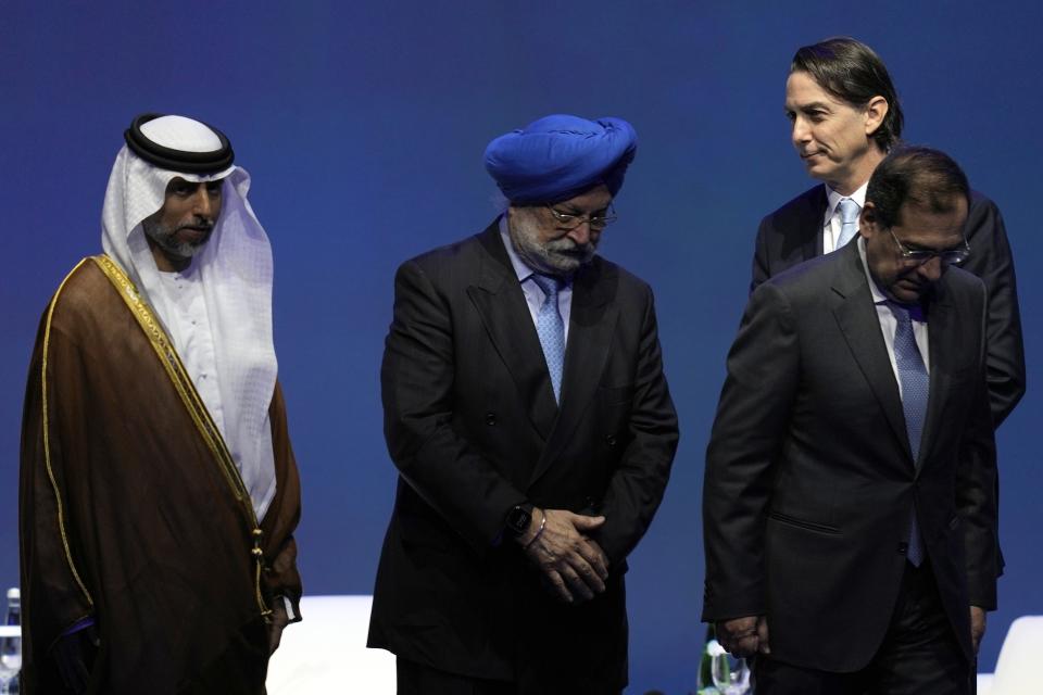 From left to right; UAE Energy Minister Suhail al-Mazrouei, India's Minister of Petroleum and Natural Gas & Housing Shri Hardeep Puri, U.S. Envoy for Energy Affairs Amos Hochstein and Minister of Petroleum and Mineral Resources Tarek EI Molla leave the podium after the opening ceremony of the Abu Dhabi International Petroleum Exhibition & Conference in Abu Dhabi, United Arab Emirates, Monday, Oct. 31, 2022. Saudi Arabia and the United Arab Emirates defended on Monday a decision by OPEC and its allies to cut oil production, even as an American envoy warned of "economic uncertainty" ahead for the world. (AP Photo/Kamran Jebreili)