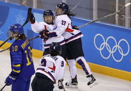 Ice Hockey - Pyeongchang 2018 Winter Olympics - Women’s Classification Match - Sweden v Korea - Kwandong Hockey Centre, Gangneung, South Korea - February 20, 2018 - Han Soo-jin of Korea celebrates with teammate Park Yoon-jung after scoring . REUTERS/David W Cerny