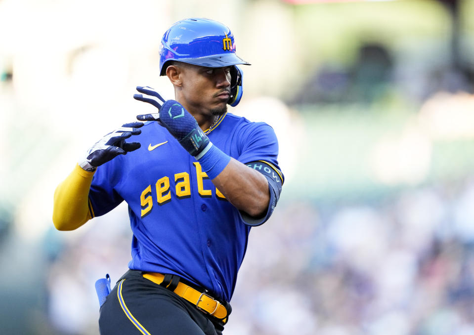 Seattle Mariners' Julio Rodriguez runs the bases after hitting a solo home run against the Pittsburgh Pirates during the first inning of a baseball game Friday, May 26, 2023, in Seattle. (AP Photo/Lindsey Wasson)