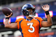 Denver Broncos quarterback Russell Wilson (3) warms up prior to an NFL preseason football game against the Minnesota Vikings, Saturday, Aug. 27, 2022, in Denver. (AP Photo/Jack Dempsey)