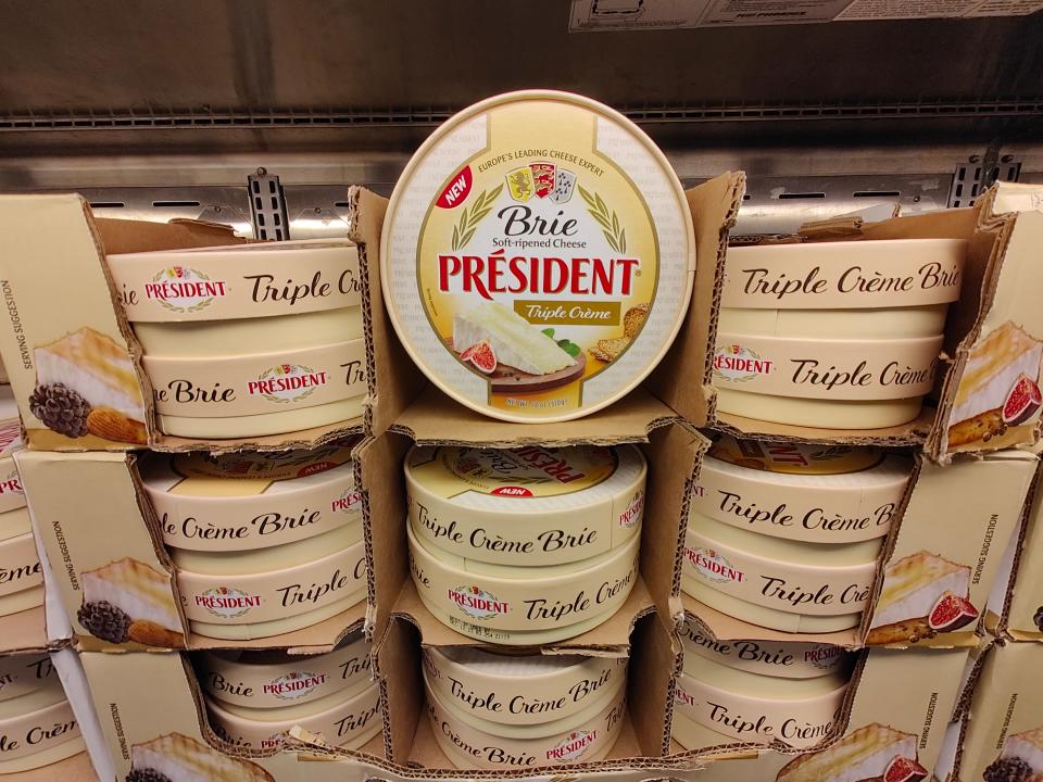 President Brie cheese wheels