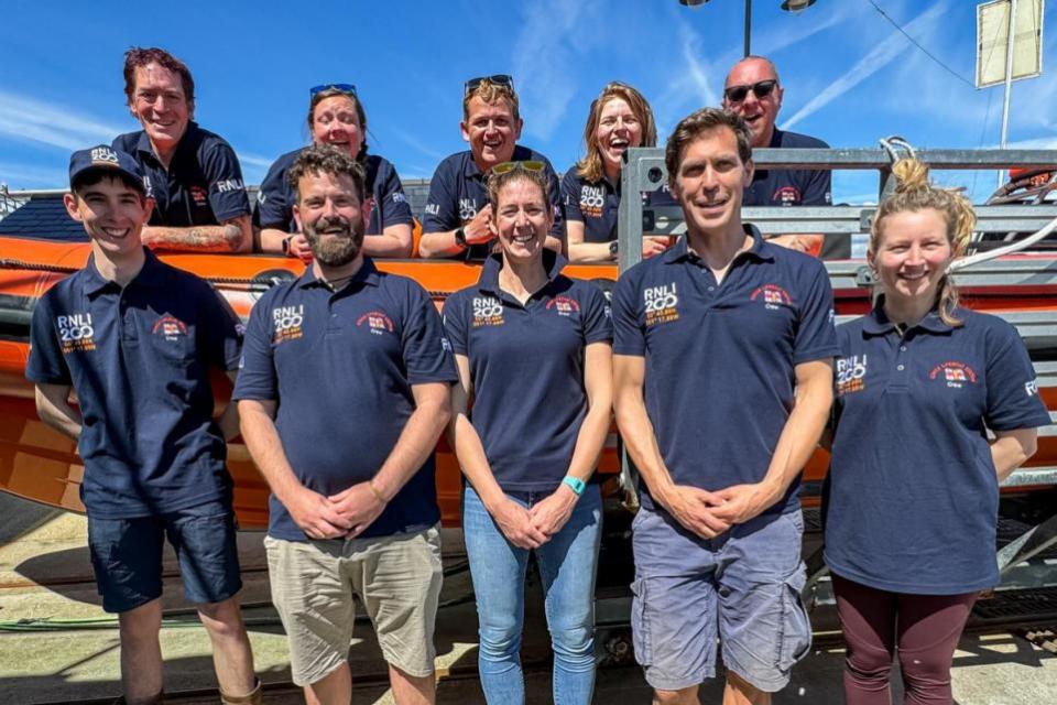 Isle of Wight County Press: Crew from the Cowes RNLI, back, from left: Ady Stothard, Katie Lewis, Willoughby Matthews, Jules Lennon and Mark Scholes; front, from left: Luca Stopps, Joshua Matthews, Libby Finch, Ned Cook and Olivia Manser.