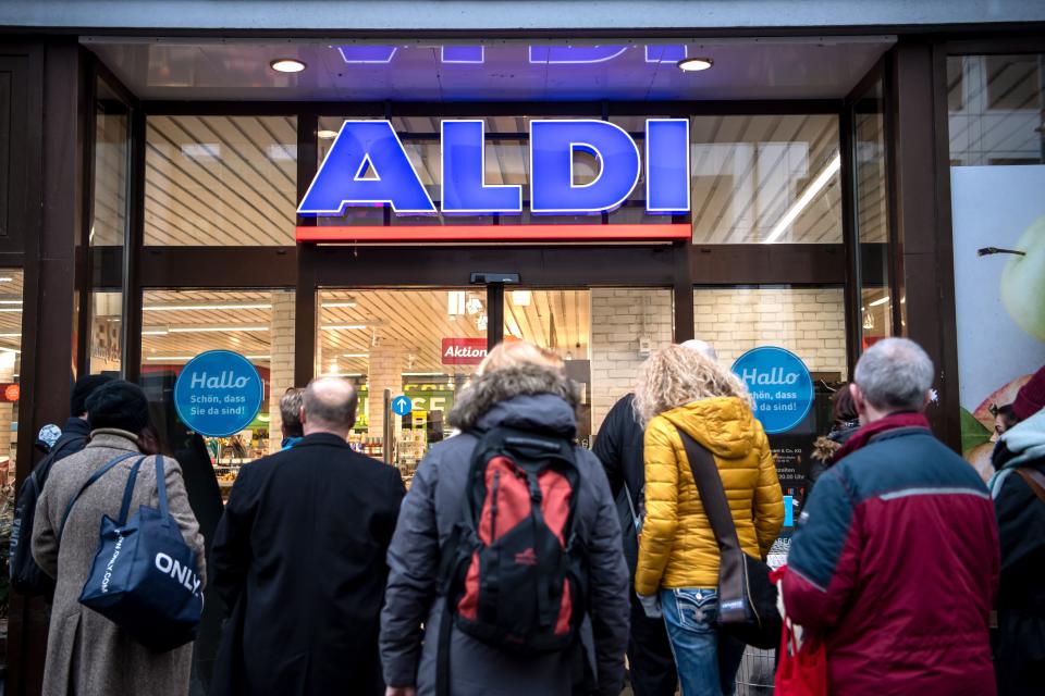 09 March 2020, Bremen: Early in the morning, customers are on the verge of opening in front of an Aldi market. Aldi sells cheap disinfectants as a special offer from the early morning. Due to the coronavirus, the demand for disinfectants has increased considerably. Photo: Sina Schuldt/dpa (Photo by Sina Schuldt/picture alliance via Getty Images)