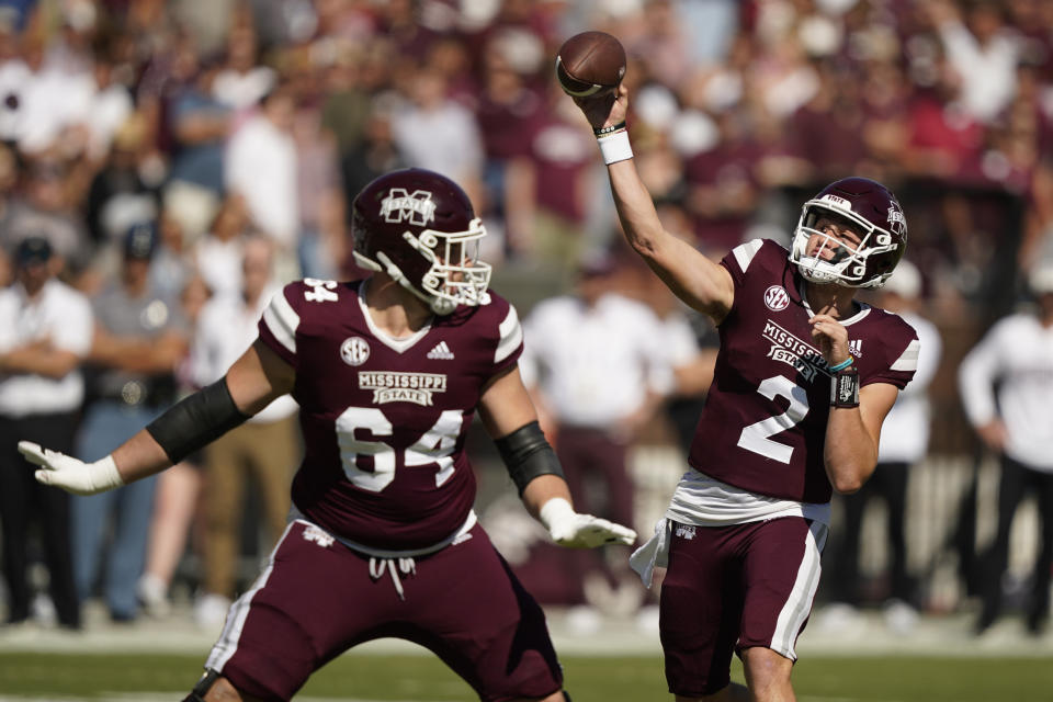 Mississippi State quarterback Will Rogers (2) throws behind the block of offensive lineman Steven Losoya III (64) during the first half of an NCAA college football game against Arkansas in Starkville, Miss., Saturday, Oct. 8, 2022. (AP Photo/Rogelio V. Solis)