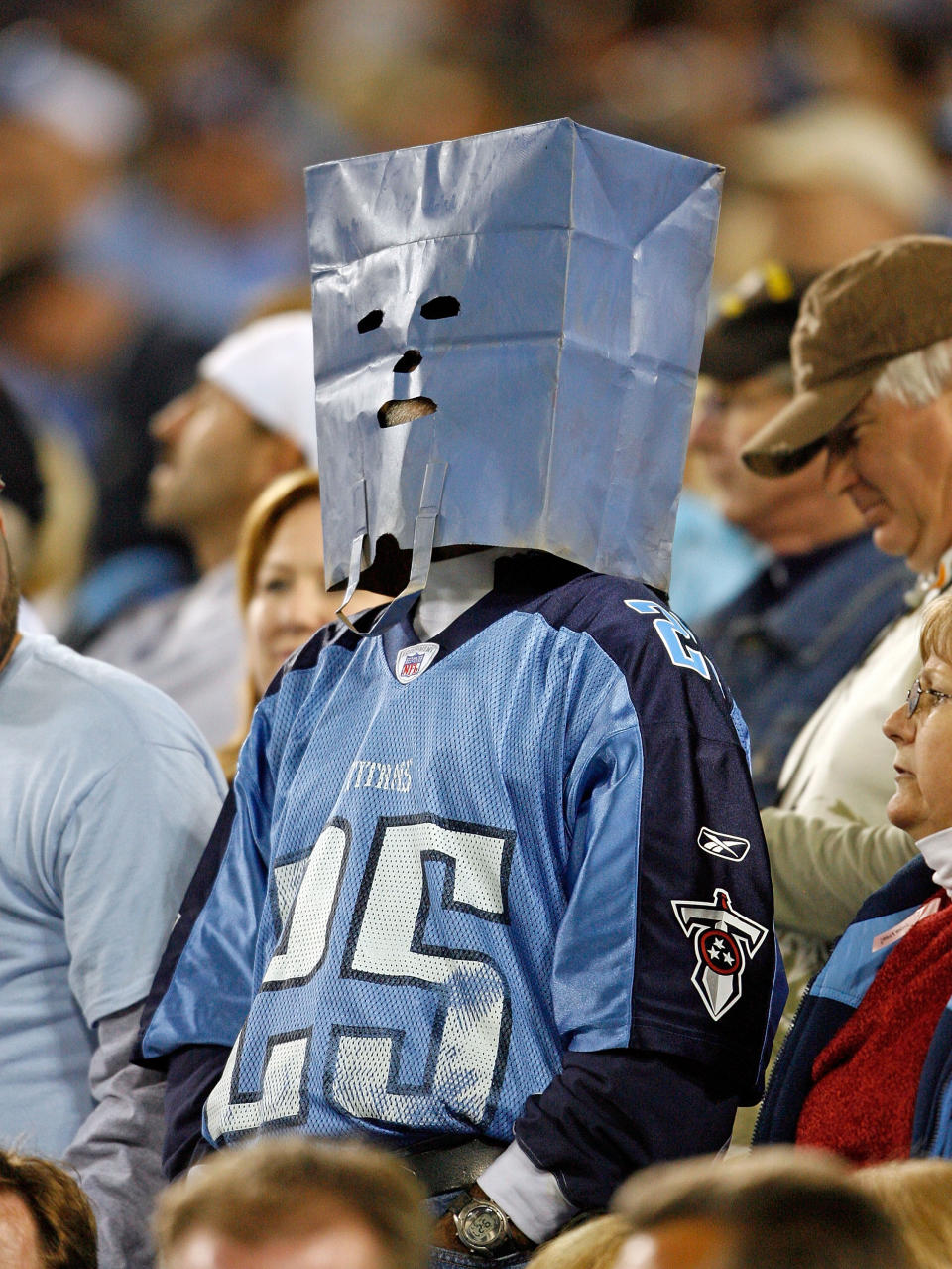 <p>A Tennessee Titans fan wears a bag on his head during the 31-9 loss to the Indianapolis Colts at LP Field on October 11, 2009 in Nashville, Tennessee. (Photo by Andy Lyons/Getty Images) </p>