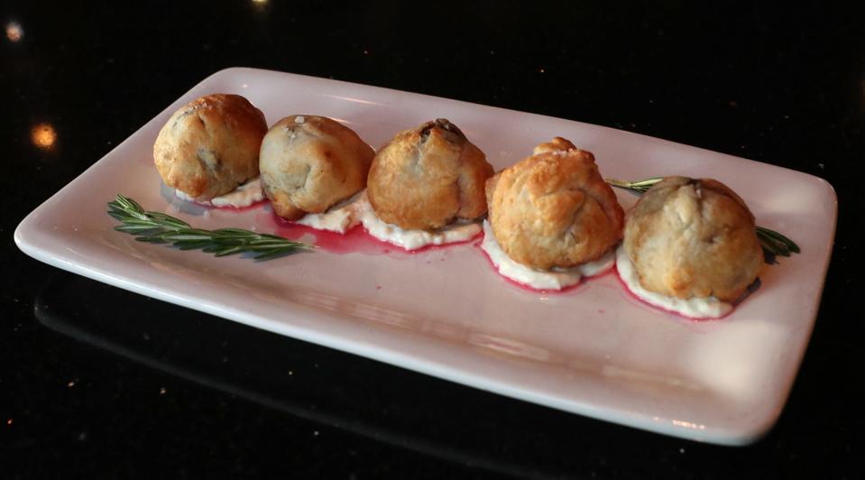 Wellington bites are one of the small plates at the new restaurant and bar The Circle of 5ths in Akron.