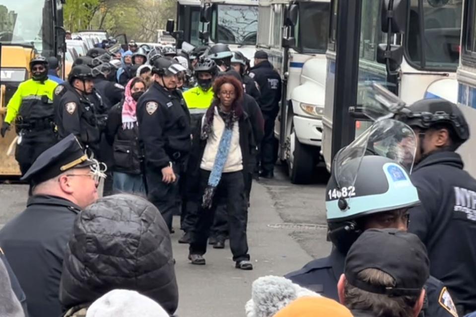 Isra Hirsi is paraded onto an NYPD bus after being arrested, along with more than 100 other anti-Israel protesters on Thursday, April 18, 2024. Matthew McDermott for NY Post