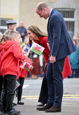 Samir Hussein/WireImage Kate Middleton and Prince William arrive at St Thomas Church on September 27, 2022 in Swansea, Wales.