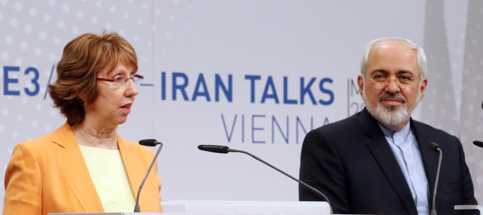 European foreign policy chief Catherine Ashton, left, and Iranian Foreign Minister Mohamad Javad Zarif, right, adress the media after closed-door nuclear talks in Vienna, Austria, Wednesday, March 19, 2014. They said the talks addressed Iran's uranium enrichment program, a nearly finished nuclear reactor and the lifting of sanctions on Iran that have been imposed successively over the past decade as Tehran expanded its atomic activities. The talks will resume April 7 in Vienna. (AP Photo/Ronald Zak)