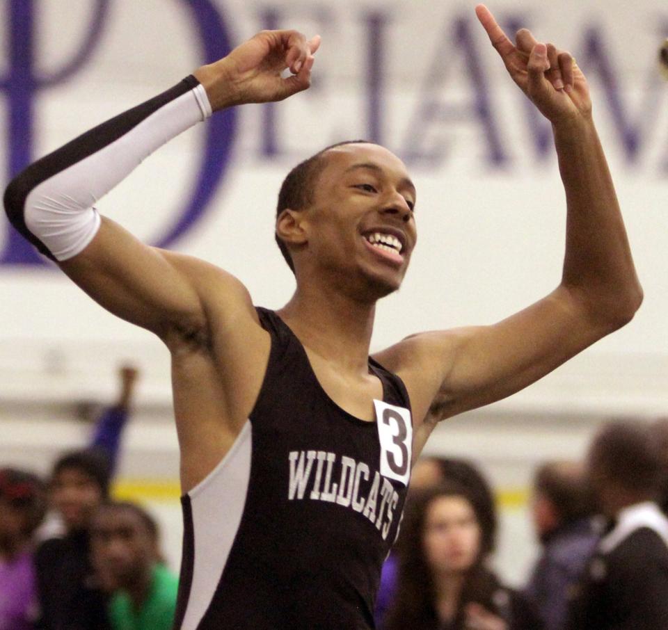 Lamar Bruton of Howard celebrates after winning the 400 meter dash during the 2013 DIAA State Indoor Track and Field Championships, at the Delaware Field House, Saturday, Feb. 9, 2013