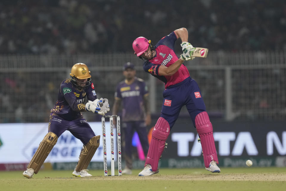 Rajasthan Royals' Jos Buttler plays a shot during the Indian Premier League cricket match between Kolkata Knight Riders and Rajasthan Royals in Kolkata, India, Tuesday, April 16, 2024. (AP Photo/Bikas Das)