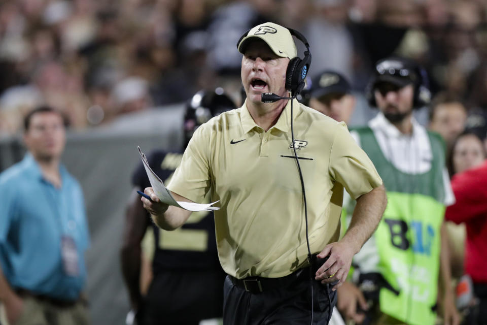 In this photo taken on Sept. 14, 2019, Purdue coach Jeff Brohm yells to an official during the second half of the team's NCAA college football game against TCU in West Lafayette, Ind., Saturday. One big advantage for the Boilermakers: Ohio State, Michigan and Penn State don't appear on the schedule. They open the season by hosting Iowa on Oct. 24. (AP Photo/Michael Conroy)