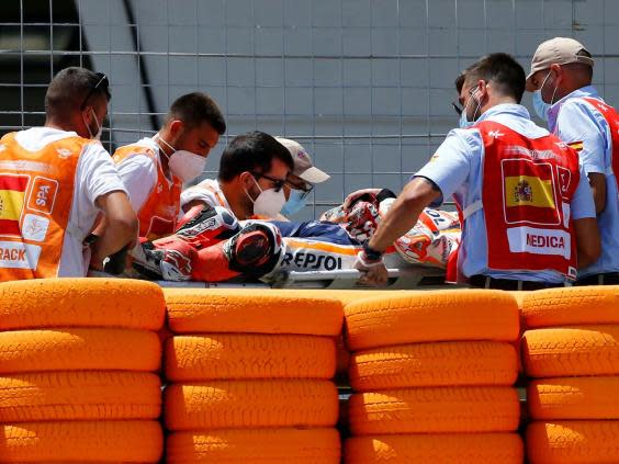 Marquez was carried away on a stretcher after the high-speed accident (Reuters)