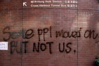 A message is written in graffiti on the campus of the Hong Kong Polytechnic University (PolyU) in Hong Kong