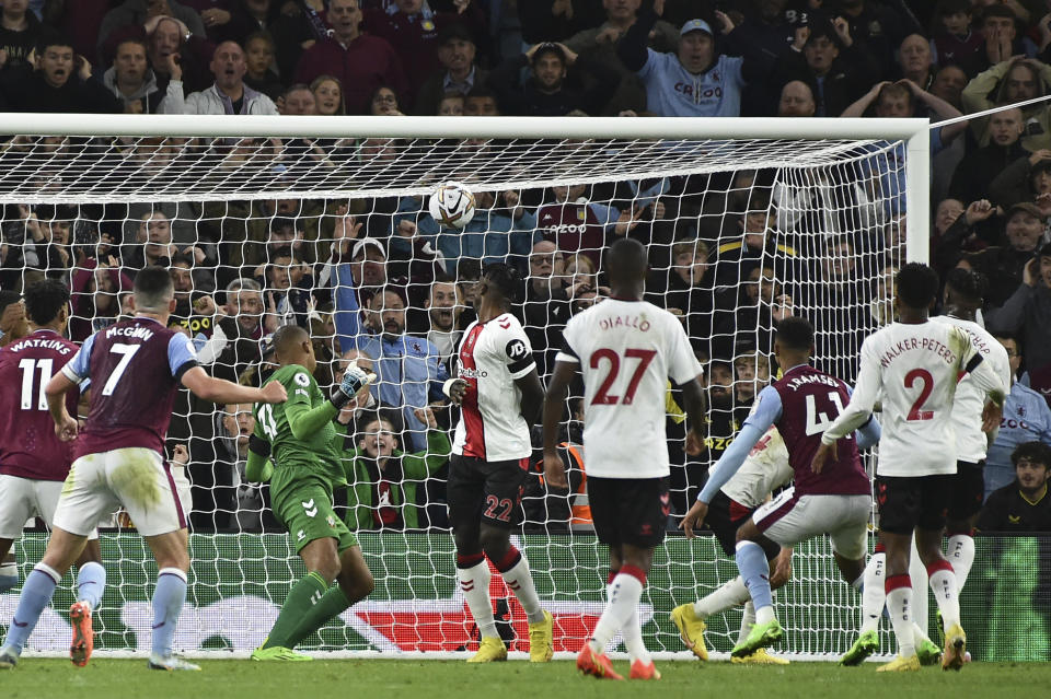 Aston Villa's Jacob Ramsey, 3rd right, scores the opening goal during the English Premier League soccer match between Aston Villa and Southampton at Villa Park in Birmingham, England, Friday, Sept. 16, 2022. (AP Photo/Rui Vieira)