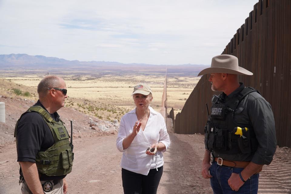 Tennessee U.S. Sen. Marsha Blackburn traveled to Arizona on March 21, 2021, to observe the U.S-Mexico border fencing. Among the people she met with were Pinal County Sheriff Mark Lamb and Cochise County Sheriff Mark J. Dannels.