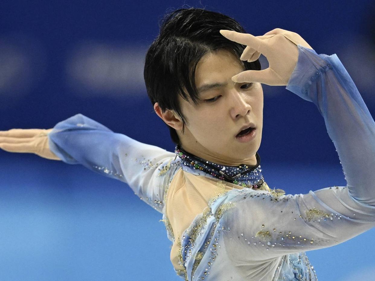 Japan's Yuzuru Hanyu competes in the men's single skating short program of the figure skating event during the Beijing 2022 Winter Olympic Games at the Capital Indoor Stadium in Beijing on February 8, 2022.