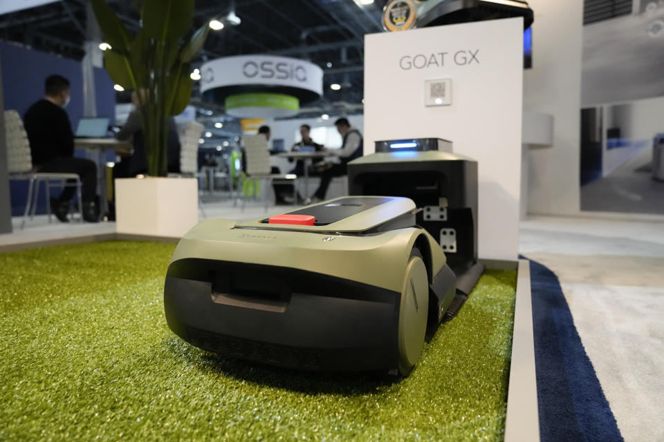 The Goat GX automated lawn mower by Ecovacs Robotics is displayed during the CES tech show Wednesday, Jan. 10, 2024, in Las Vegas. (AP Photo/Ryan Sun)
