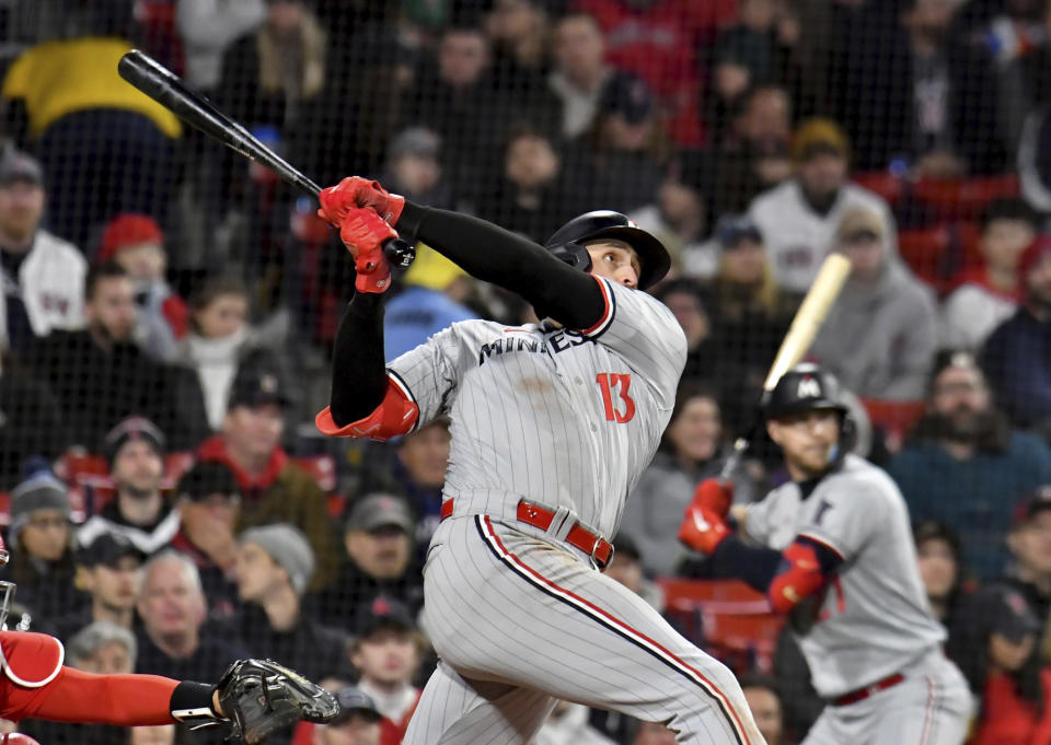 Minnesota Twins' Joey Gallo watches his home run in the third inning of the team's baseball game against the Boston Red Sox at Fenway Park, Wednesday, April 19, 2023, in Boston. (AP Photo/Mark Stockwell)