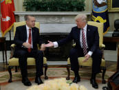 <p>President Donald Trump reaches to shake hands with Turkish President Recep Tayyip Erdogan in the Oval Office of the White House in Washington, Tuesday, May 16, 2017. (Photo: Evan Vucci/AP) </p>