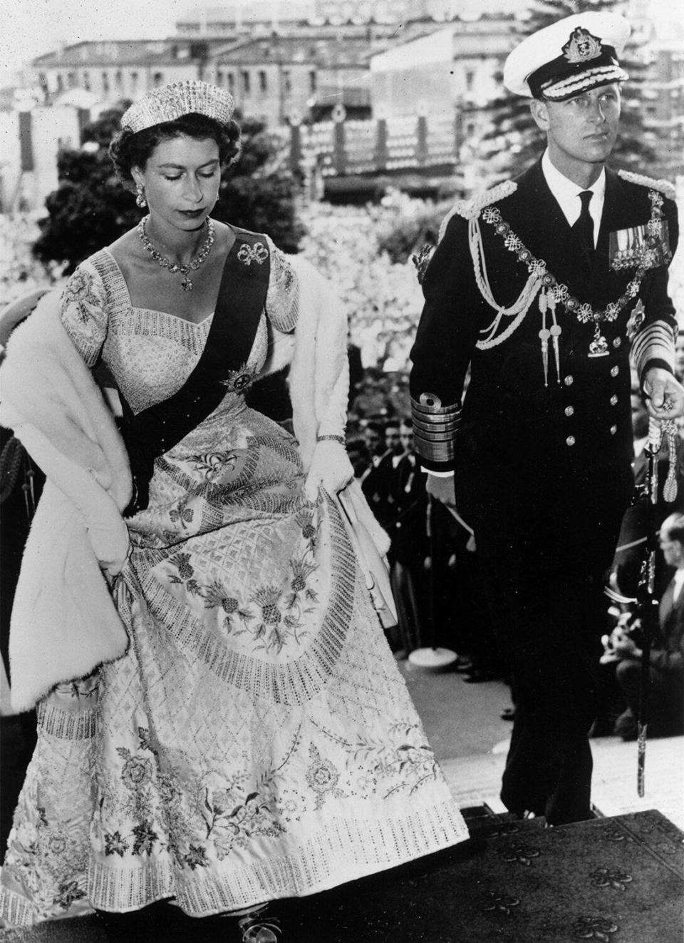 18th January 1954: Queen Elizabeth II, wearing her Coronation dress, arriving with the Duke of Edinburgh to open Parliament in Wellington, New Zealand.