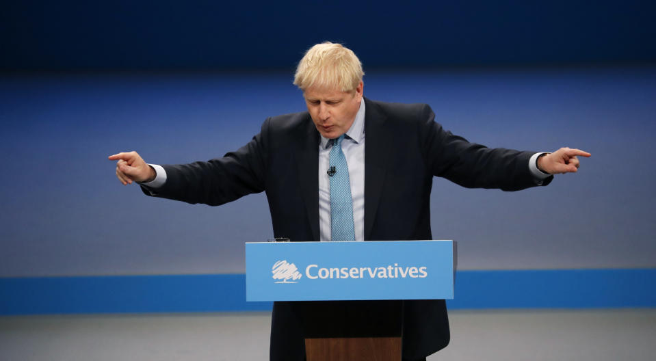 Britain's Prime Minister Boris Johnson delivers his Leader's speech at the Conservative Party Conference in Manchester, England, Wednesday, Oct. 2, 2019. Britain's ruling Conservative Party is holding their annual party conference. (AP Photo/Frank Augstein)