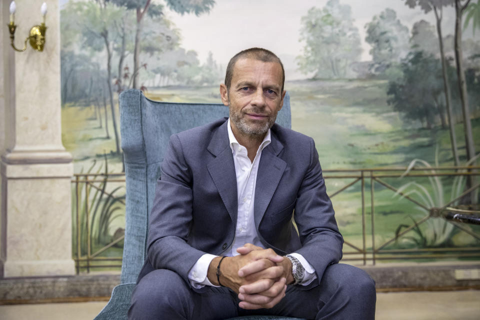 FILE - In this file photo dated Sunday, Aug. 23, 2020, UEFA President Aleksander Ceferin poses for a picture during an interview with The Associated Press in Lisbon, Portugal. Ceferin said Friday April 23, 2021, that the Spanish and Italian clubs still clinging to the Super League must disavow the breakaway or face being banned from the Champions League. (AP Photo/Manu Fernandez, FILE)