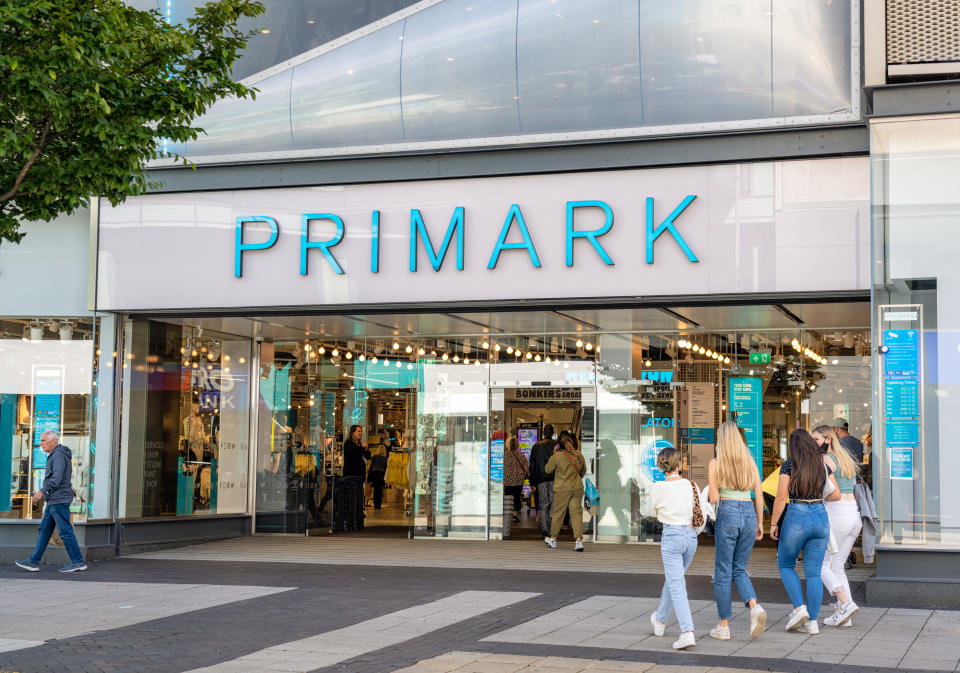 Birmingham, UK - People outside the exterior of a Primark shop in Birmingham's city centre.