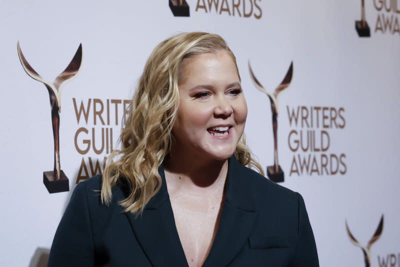 Amy Schumer arrives on the red carpet at the 75th Writers Guild Awards Ceremony at Edison Ballroom on March 5 in New York City. She is among dozens of top stars signing an open letter on Monday demanding the release of Israeli hostages. File Photo by John Angelillo/UPI