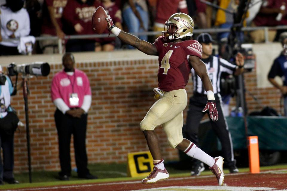 FSU running back Dalvin Cook (4) celebrates his third touchdown of the game as Florida State beats Miami 29-24 at Doak Campbell Stadium.