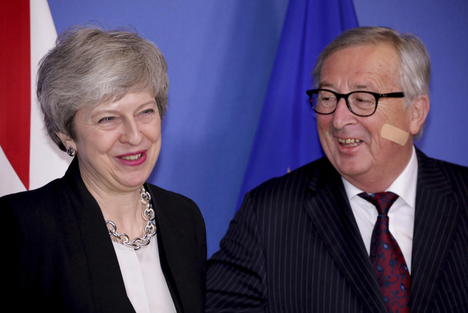 British Prime Minister Theresa May, left, is greeted by European Commission President Jean-Claude Juncker prior to a meeting at EU headquarters in Brussels, Wednesday, Feb. 20, 2019. European Commission President Jean-Claude Juncker and British Prime Minister Theresa May meet Wednesday for their latest negotiating session to seek an elusive breakthrough in Brexit negotiations. (AP Photo/Olivier Matthys)