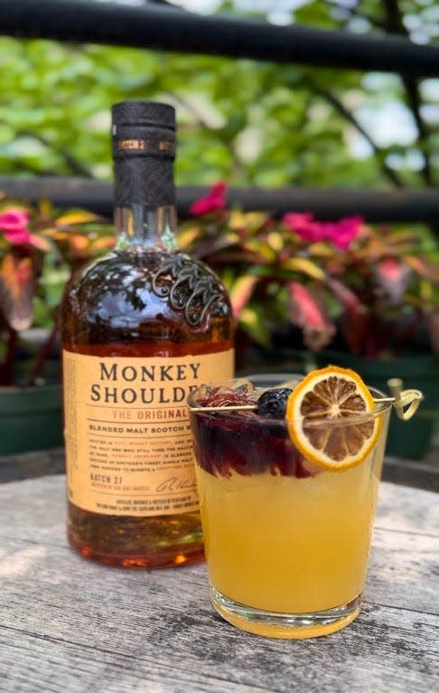 The Side Piece (Monkey Shoulder Scotch, lemon, peach, ginger beer and ruby port) available at Teak in Red Bank.