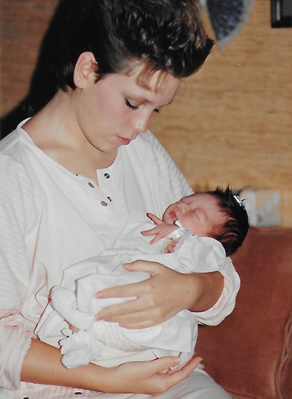Angie Howard, at age 17, holds her newborn baby Rachel Ruiz before placing her for adoption. The pair would reunite 34 years later. (Courtesy Rachel Ruiz)